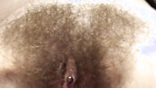 Pulling my hairy pussy lips apart for you to see inside my tiny hole